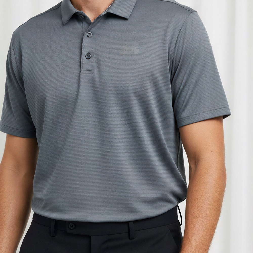 Under Armour Men's Dark Gray Polo Shirt.  CAJA. # 2‎ A